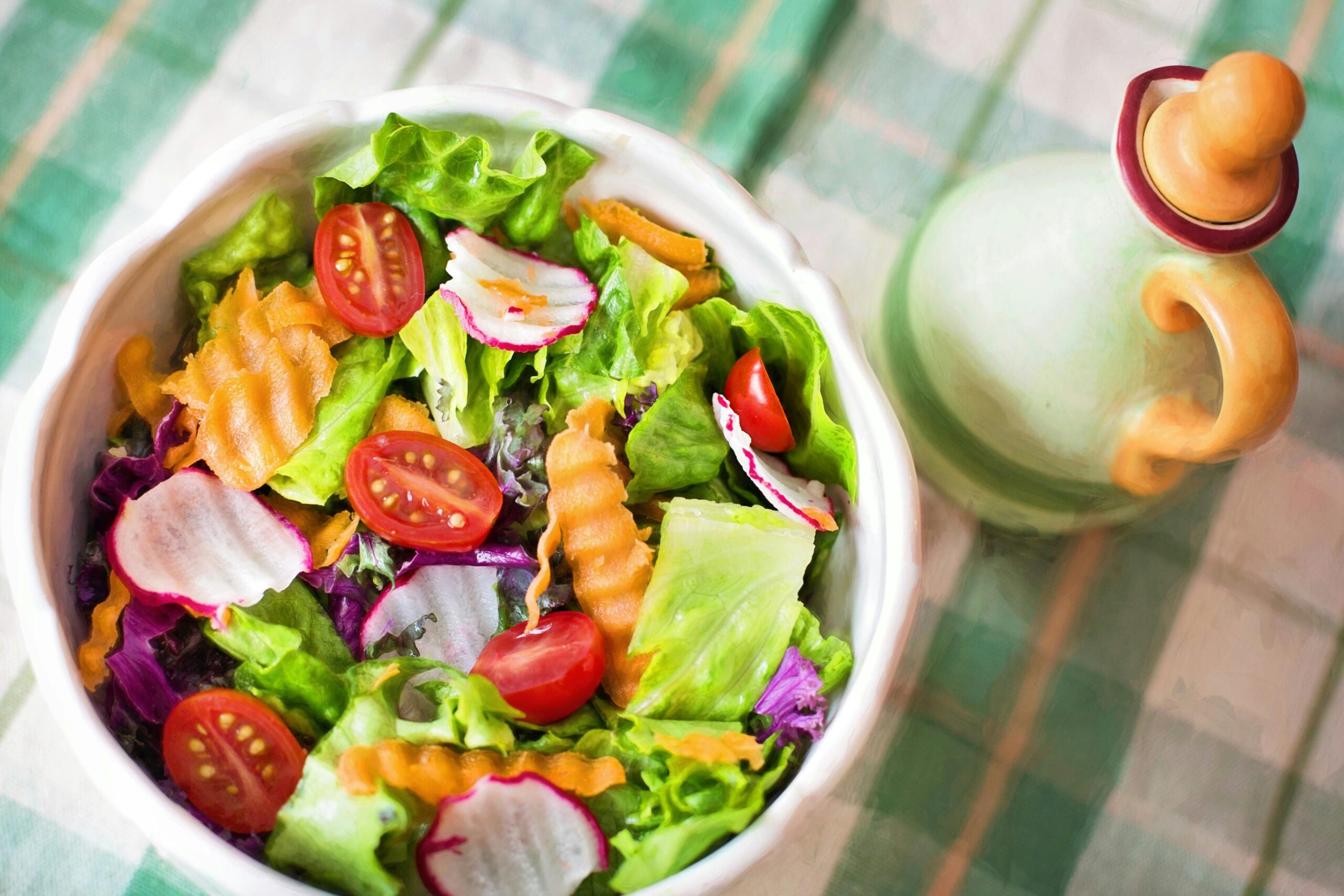 A fresh, colorful salad filled with vegetables, lean proteins, and healthy fats, representing a heart-friendly meal for blood pressure management.